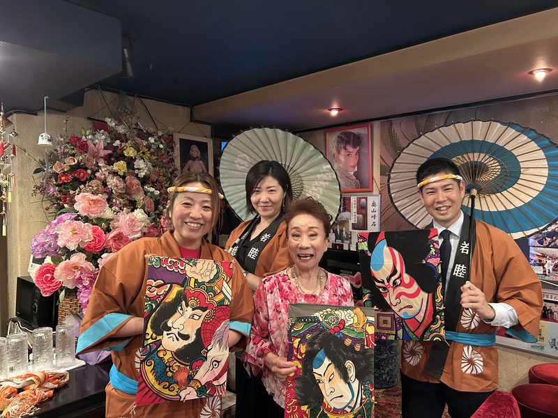 In happi coats at the Akabane Baka Matsuri, a neighbourhood festival we turned into a tour