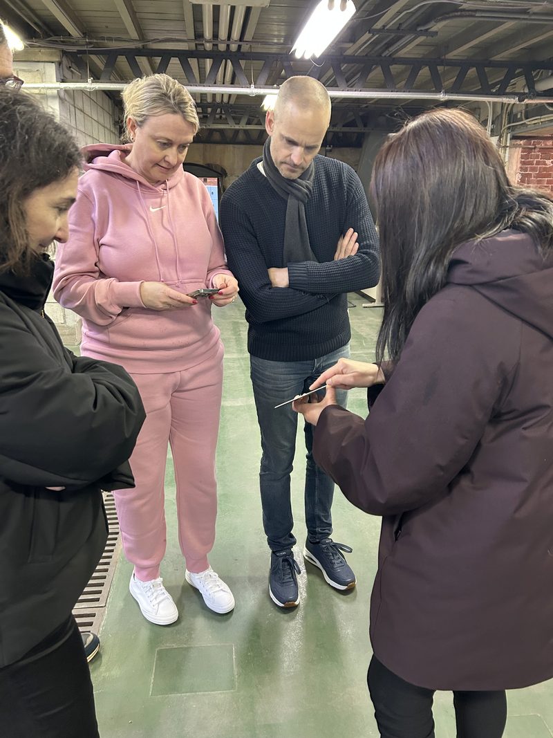 Guests in the rice store of a red-brick sake brewery