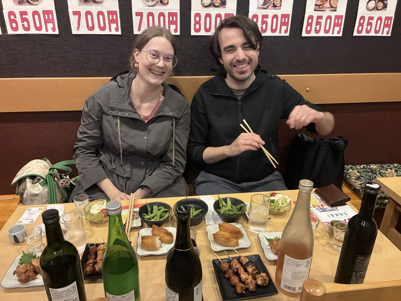 Five sakes and small plates at a standing izakaya