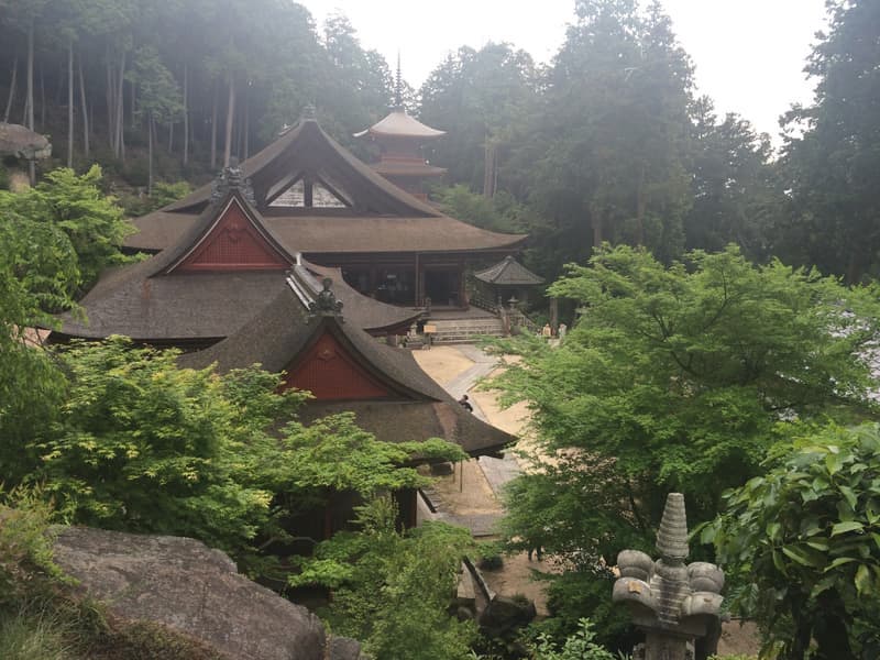 A thatched traditional farmhouse in the Japanese countryside