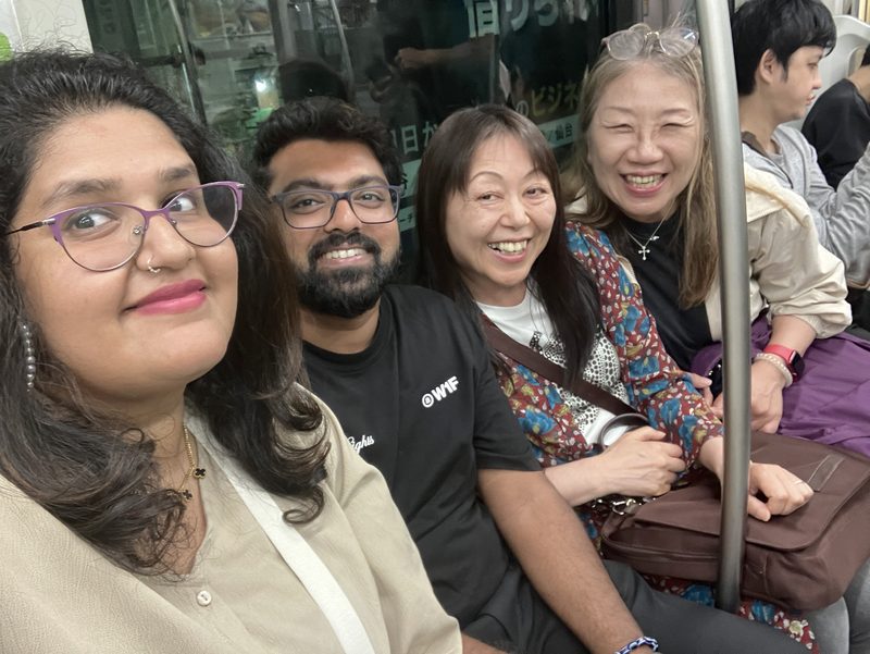 Guests and their guide aboard the Tokyo Sakura Tram